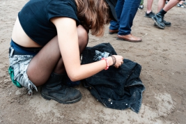 A-girl-stitching-plaque-during-concert-of-25th-PolandRock-festival-Kostrzyn-20190801